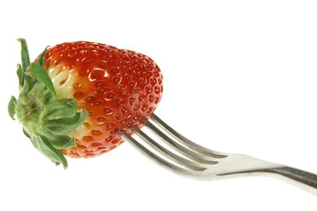 Strawberry on forkの写真素材