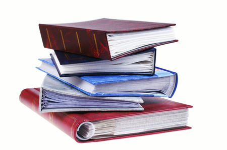 Pile of photo albums isolated on whiteの写真素材