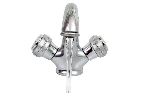 Close-up of chrome  tap isolated on white backgroundの写真素材