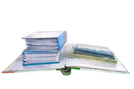 Pile of colorful photo--albums isolated on white backgroundの写真素材