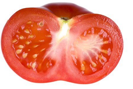Half of tomato isolated on white backgroundの写真素材