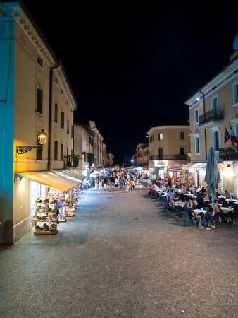 Piazza Giacomo Matteotti in the village of Bardolino during a summer nightのeditorial素材