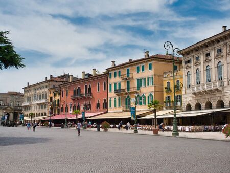 Local businesses and restaurants located in front of the Verona Arena in Piazza Bra during the dayのeditorial素材