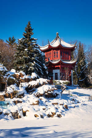 January 24, 2021 - Montreal Botanical Garden, Quebec, Canada - The Tower of Condensing Clouds at Chinese Garden in winter with snow - Montreal Botanical Gardenのeditorial素材