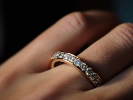 A glittering diamond eternity ring on a stunning finger created with Generative AIの素材
