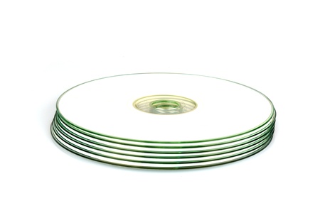 Stack of 6 DVDs / CDs with white surfaceの写真素材