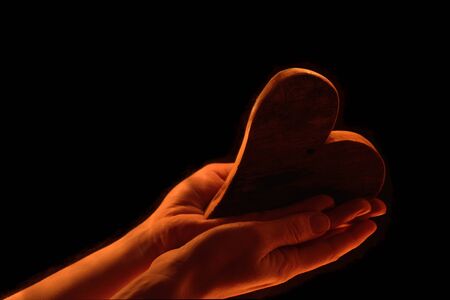 Heart in female handsの写真素材