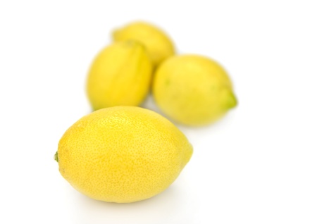 Isolated lemons over white backgroundの写真素材