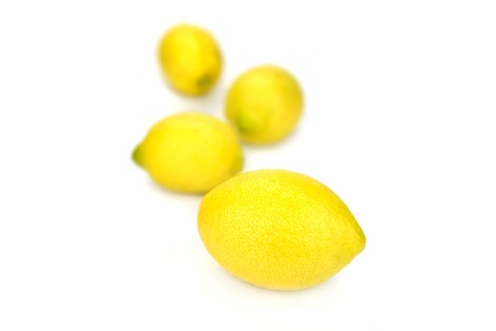 Isolated lemons over white backgroundの写真素材