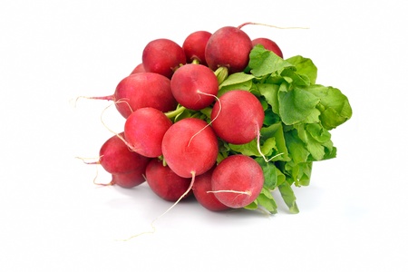 Close-up of a bunch of radishes over white backgroundの写真素材