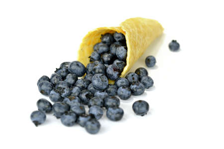 Blueberries in a waffle roll downの写真素材