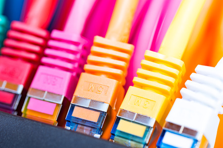 Colorful network cables connected to a switch