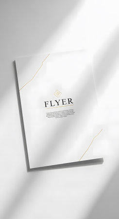 Clean flyer mockup conveys elegance simple white paper ideal presentation promotions designs marketing projects displays messages advertisements.の素材
