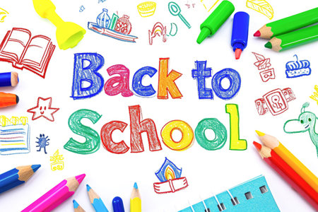 Back to school concept with colorful crayons on a white backgroundの素材