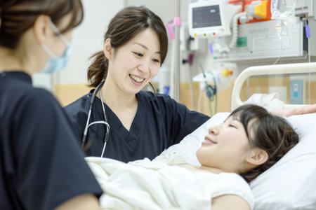 Asian nurse and patient in hospital room. Healthcare and medical concept.の素材