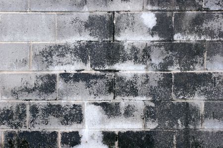 Closeup of weathered brick wall.の写真素材