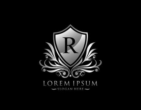 Luxury Shield R Letter Logo. Graceful Elegant Silver shield icon design.のイラスト素材
