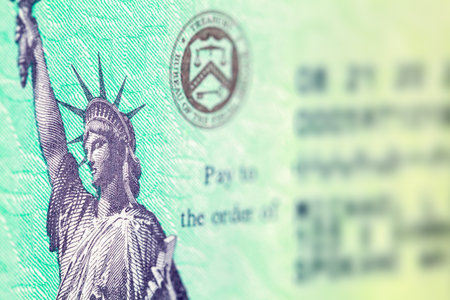 Federal Tax Refund Check Close Up of Statue of Liberty.のeditorial素材
