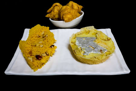 Front view of Indian dessert namely Ghewar or Ghevar is a Rajasthani, Punjabi creamy dessert. Made...