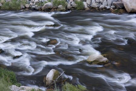a whitewater river in Colorado Rocky Mountains with a long exposure