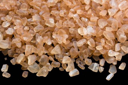 Crystals of traditional Hawaiian alaea sea salt containing red clay and rich in minerals.の写真素材