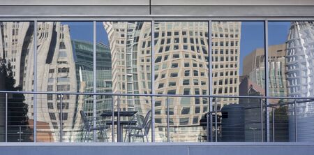 distorted cityscape of San Francisco as reflected by building windows at Yerba Buena Gardensの写真素材