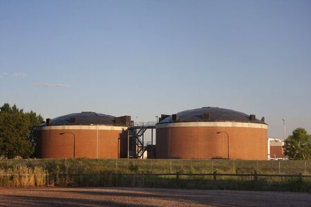 two brick round biotower structures at water reclamation facility, Fort Collins, Coloradoの写真素材
