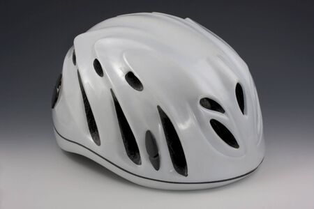 white protective helmets with vents for adventure racing and other extreme sportsの写真素材