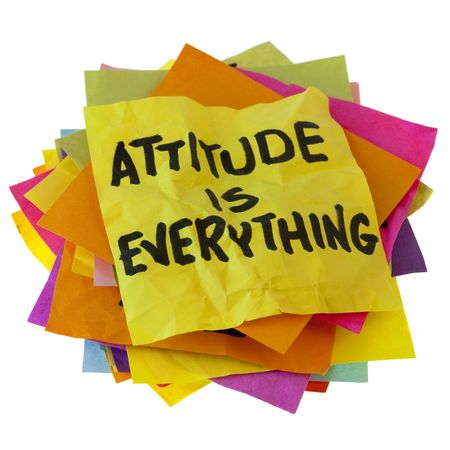 motivational slogan on a stack of colorful reminder notes isolated on whiteの写真素材