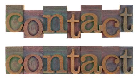 the word contact (two layouts) in old wooden letterpress type blocks, stained by colorful ink, isolated on whiteの写真素材