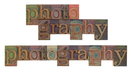 the word of photography in vintage wooden letterpress type blocks, stained by color ink, isolated on...