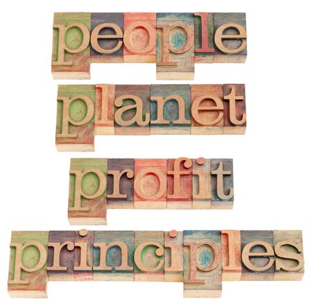sustainable business concept - people, planet, profit, principles words in vintage wood letterpress printing blocks, isolated on whiteの写真素材
