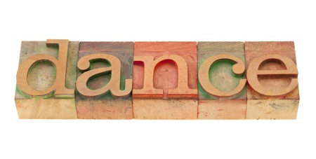 dance word in vintage wood letterpress printing blocks, isolated on whiteの写真素材