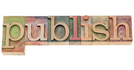publish  - isolated word in vintage wood letterpress printing blocksの写真素材