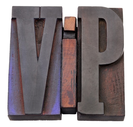 VIP (very important person)  acronym - isolated vintage wood letterpess printing blocks stained by color inksの写真素材