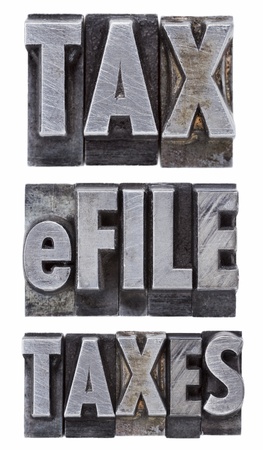 e-file taxes - tax concept - a collage of isolated words in vintage grunge metal letterpress typeの写真素材