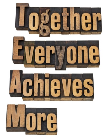 TEAM - together everyone achieves more - teamwork and cooperation concept - a collage of isolated words in vintage letterpress printing blocksの写真素材