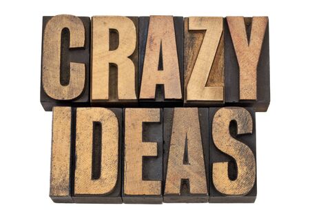 crazy ideas - creativity concept - isolated text in vintage  letterpress woodtypeの写真素材