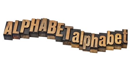 alphabet word in upper and lower case - isolated text in vintage letterpress wood typeの写真素材