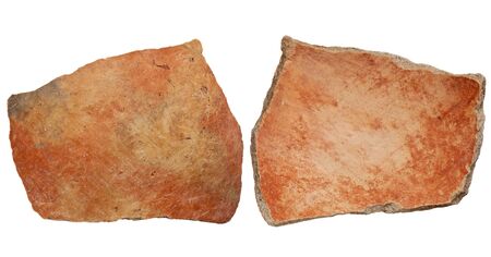 Arizona Anasazi pottery shard, ancient Native American Indian artifact, two sides of a large bowl fragment, isolated on whiteの写真素材