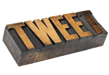 tweet - social media concept - isolated word in vintage letterpress wood  type