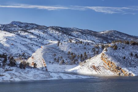 Horsetooth Rock and Reservoir near Fort Collins, Colorado, winter scenery with strong windの写真素材