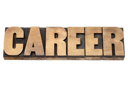 career word - isolated text in vintage letterpress wood type printing blocksの写真素材