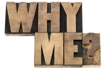 Why me question - isolated text in vintage letterpress wood type printing blocksの写真素材