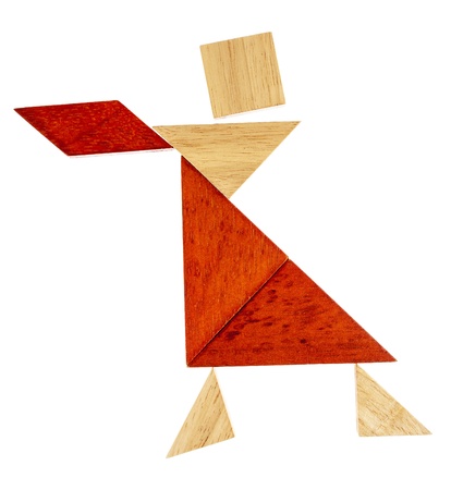 abstract figure of a female dancer or waitress built from seven tangram wooden pieces, a traditional Chinese puzzle gameの写真素材