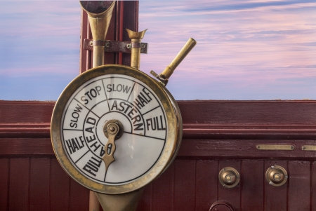 engine controls (telegraph) on a vintage ship bridgeの写真素材
