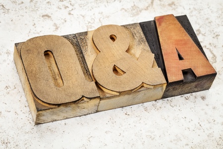 questions and answers i- Q&A acronym - text in vintage letterpress wood type on a ceramic tile...