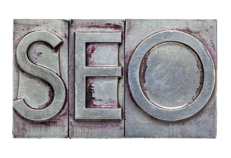 SEO (search engine optimization) acronym - isolated text in vintage letterpress metal typeの写真素材