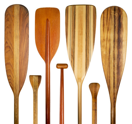 blades and grips of wooden canoe paddles, a variety of styles and shapesの写真素材