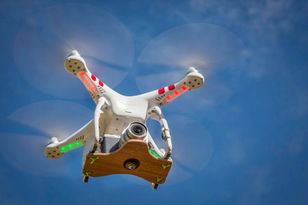 FORT COLLINS, CO, USA, November 2, 2014:  Airborne radio controlled Phantom 2 quadcopter drone...